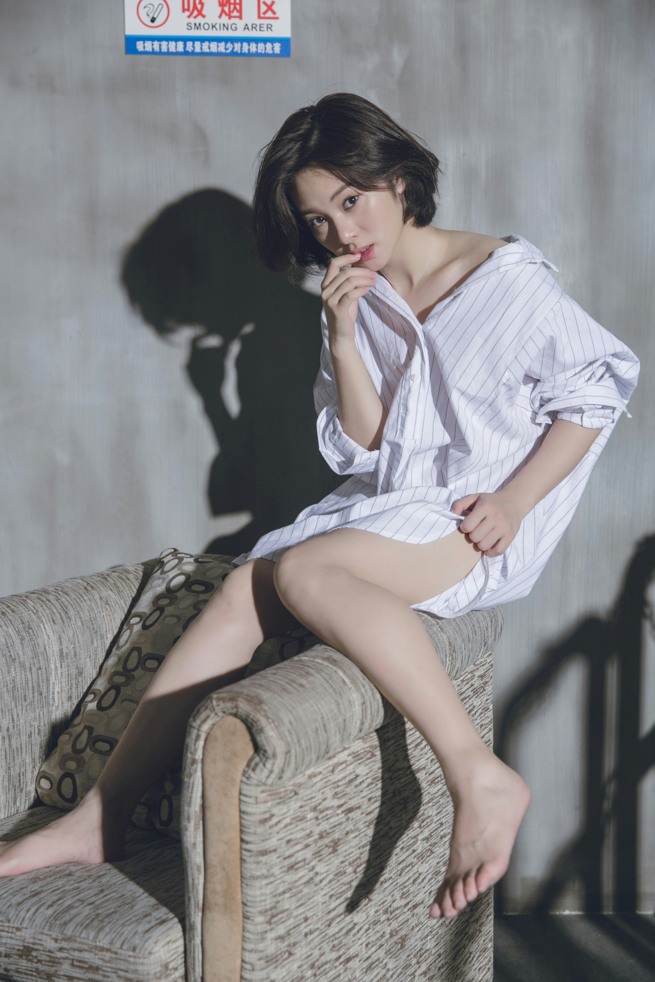 a woman sitting on a chair